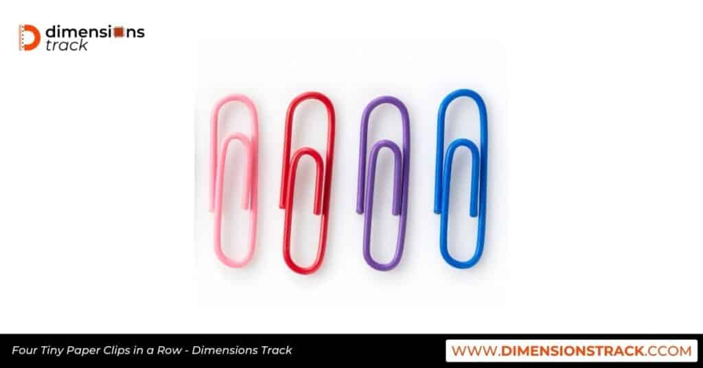 Four Tiny Paper Clips in a Row